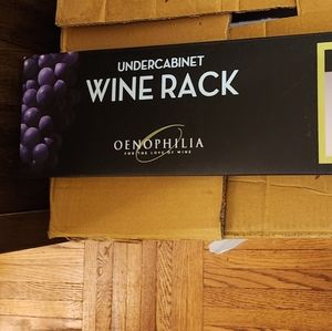 Under the cabinet metal wine rack. Six bottles capacity